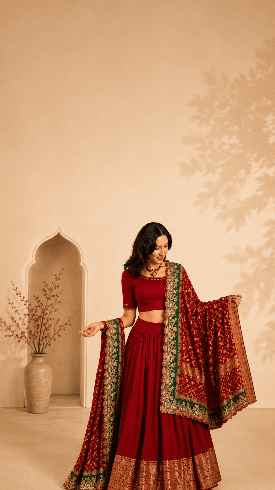 Woman styling a red Bandhej dupatta
