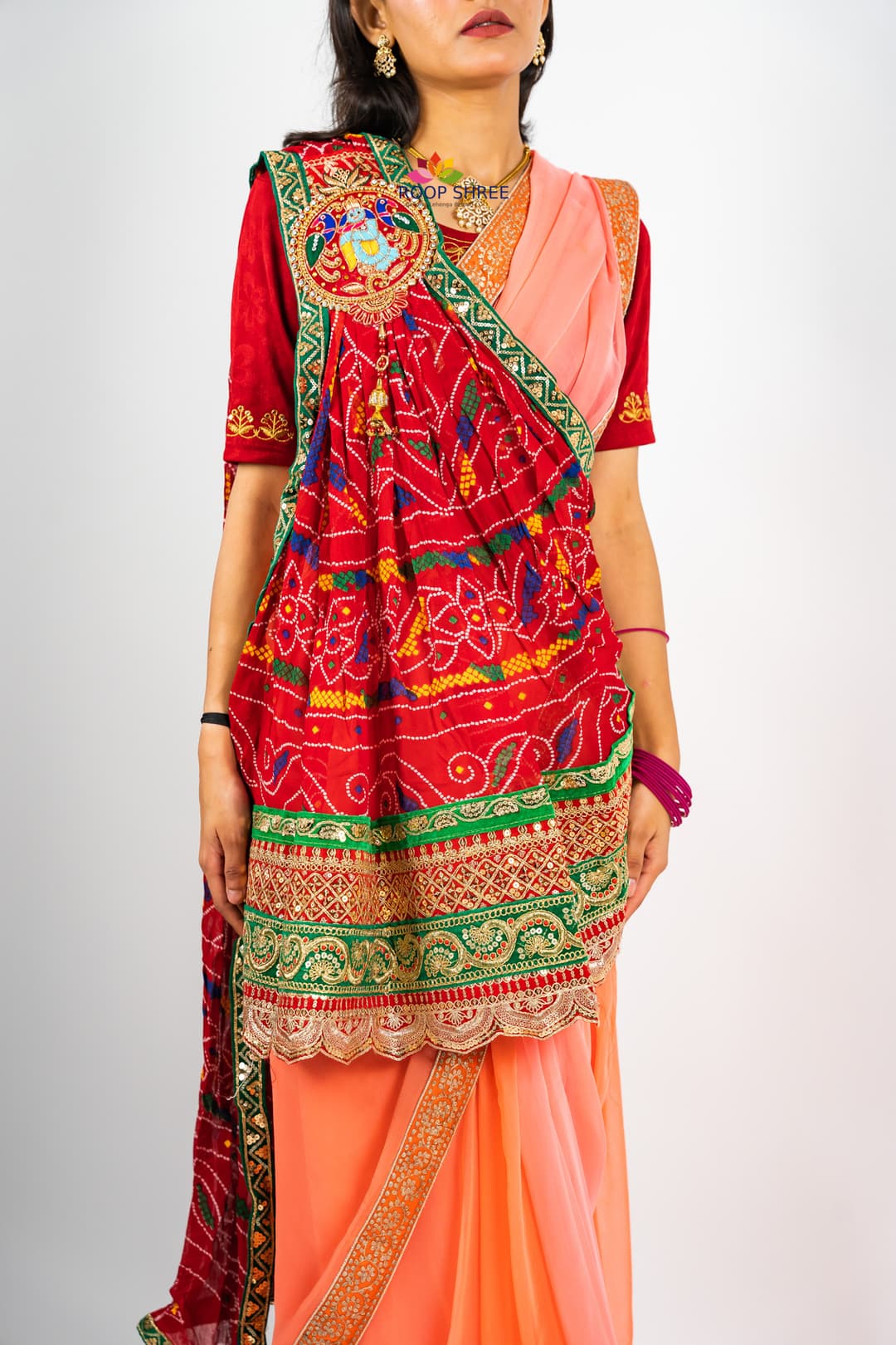 Traditional odhna adorned with Krishna brooch