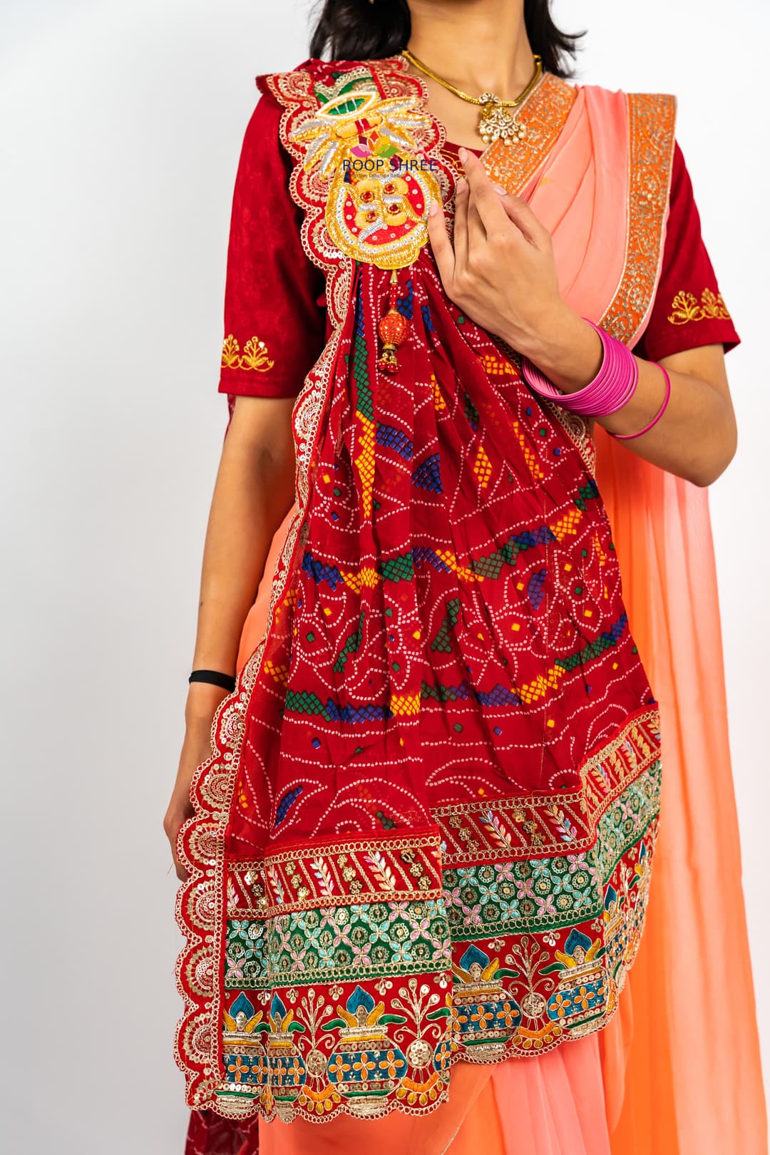 One side adorned with Kalash buta brooch