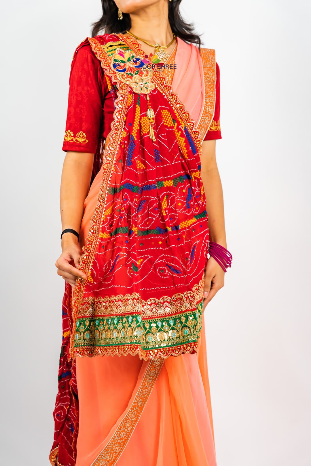 One side adorned with Peacock buta brooch and Cutwork Lace