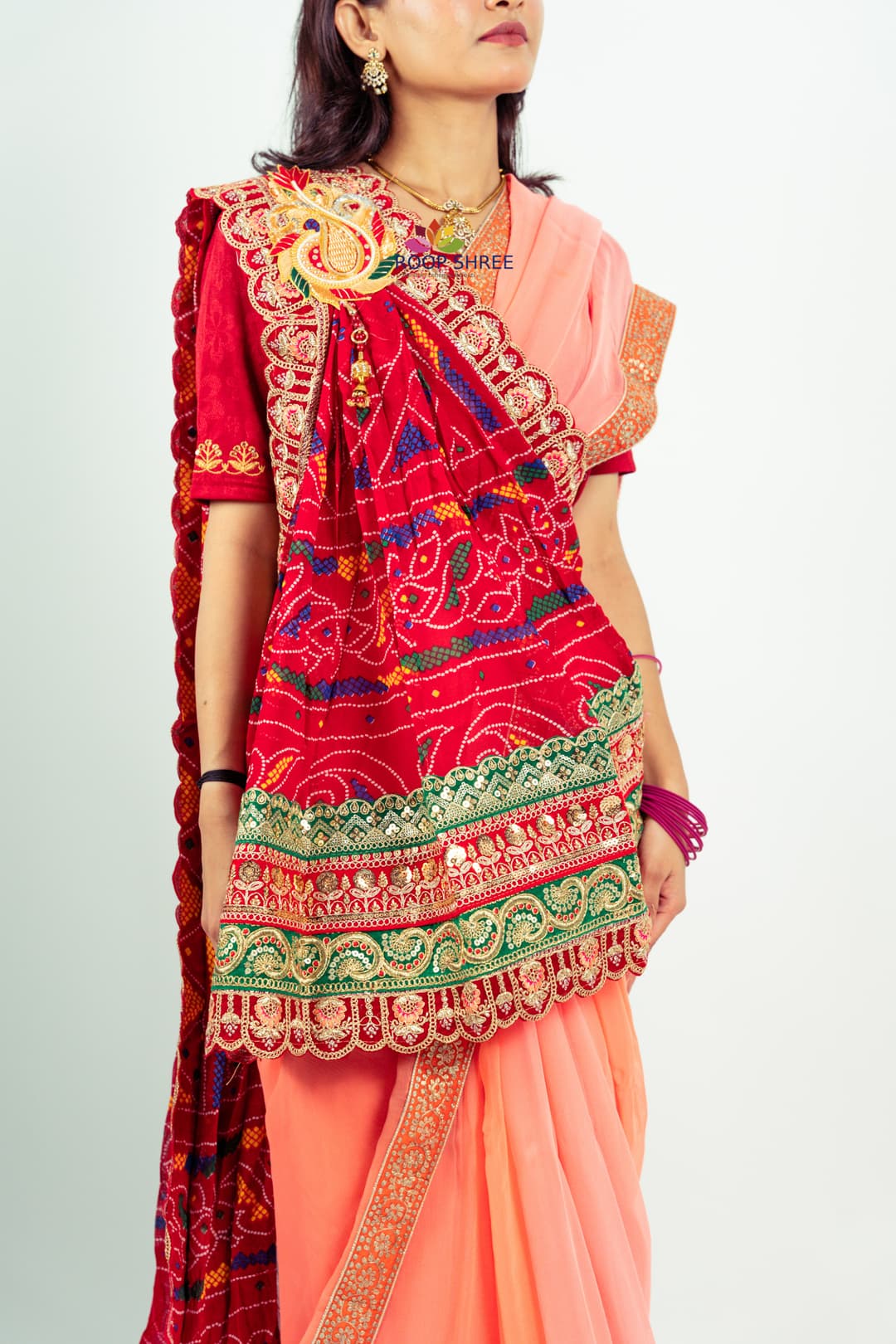 Traditional Peela Chunri Pomcha with elegant one-side brooch work.