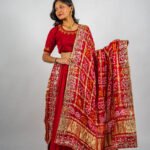 Vibrant Bandhani Gajji Silk Dupatta Enhanced with Gotta patti and Zardozi Work